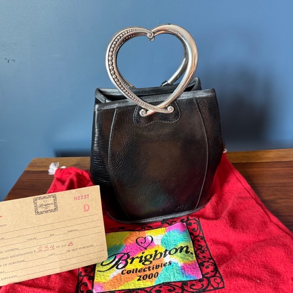 Retired collectible cowhide and leather purse. - Picture 2 of 2